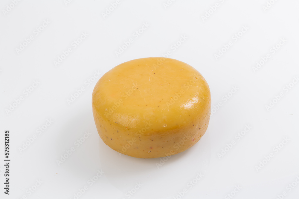 A piece of fresh processed cheese isolated on a white background A piece of fresh processed cheese isolated on a white background