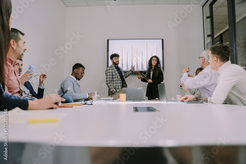 Diverse group of people working together at the office training room