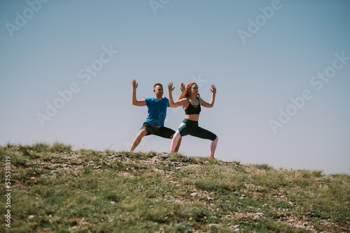Yoga poses on the top of the mountain