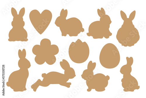 Easter bunny, flower, egg silhouette shapes. Spring design template with cute rabbit silhouettes for die cutting craft, Easter cookie cutter shapes, or gift tag label. Simple minimal spring symbols.
