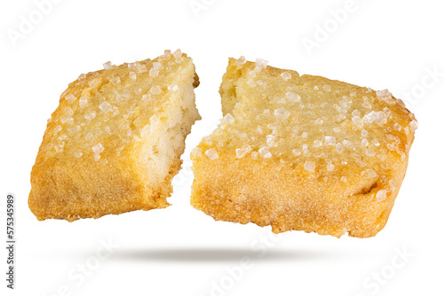 Two halves of a Rectangular shortbread biscuits with coated sugar isolated on a white Background. Close up macro photography.
