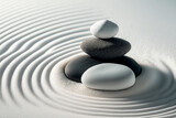 Balanced tall stack of stones in white sand with ripples. Zen garden circles meditation nature beach background. Generative AI	