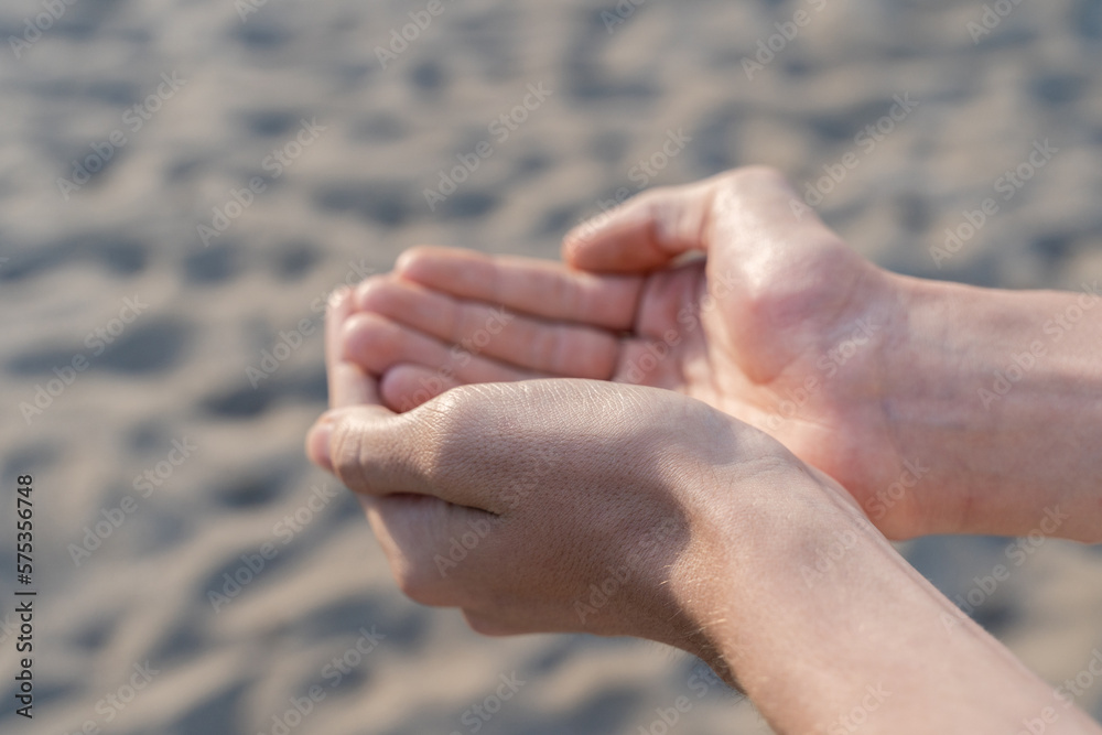 Man empty hands open up on desert background. No water, hot summer Man empty hands open up on desert background. No water, hot summer