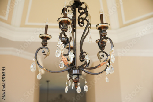 Chandelier hanging at home showing decoration of glass and metal 