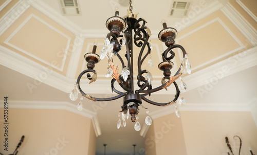 Chandelier hanging at home showing decoration of glass and metal 