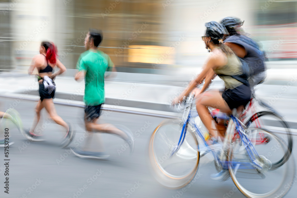 Fototapeta premium cyclists on city street