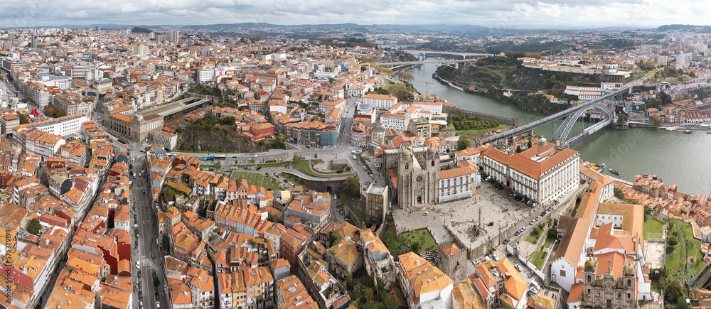 Aerial drone point of view of Porto city. View of old town center, Cathedral of Porto, Douro River, Luis I Bridge. Travel destination and the second-largest city in Portugal.