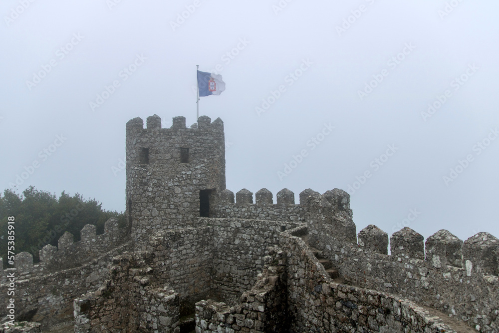 turret on the Castle of the Moors on a foggy day in Sintra Portugal