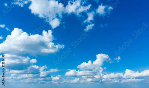 blue sky background with tiny clouds