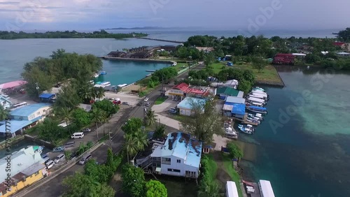 Seascape of Koror island in Palau. Clear Water and Cityscape with street and traffic in Background