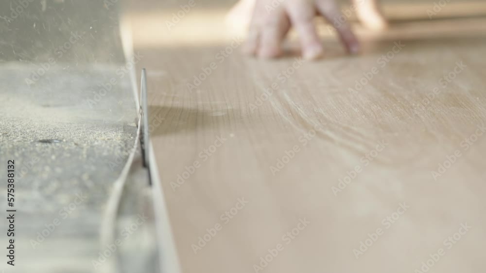cutting wood on a circular saw in joinery cutting wood on a circular saw in joinery
