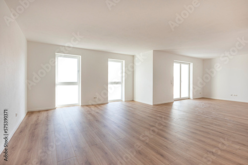 Empty room in residential home with open windows