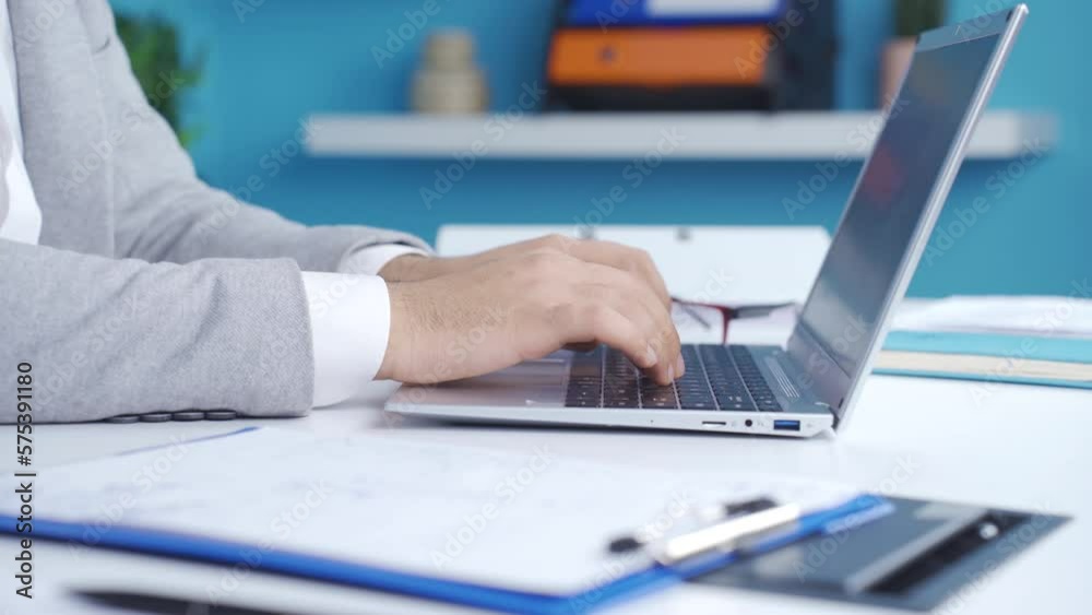 Close-up of businessman hands using laptop. Working, Office worker.
Businessman in suit is working on laptop in office and typing on keyboard.
Close-up of businessman hands using laptop. Working, Office worker.
Businessman in suit is working on laptop in office and typing on keyboard.