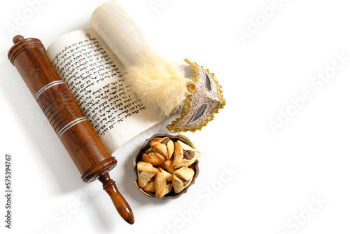 Obraz na plátně The Scroll of Esther and Purim Festival objects (rattles, masquerade mask, Hamantaschen) on white background