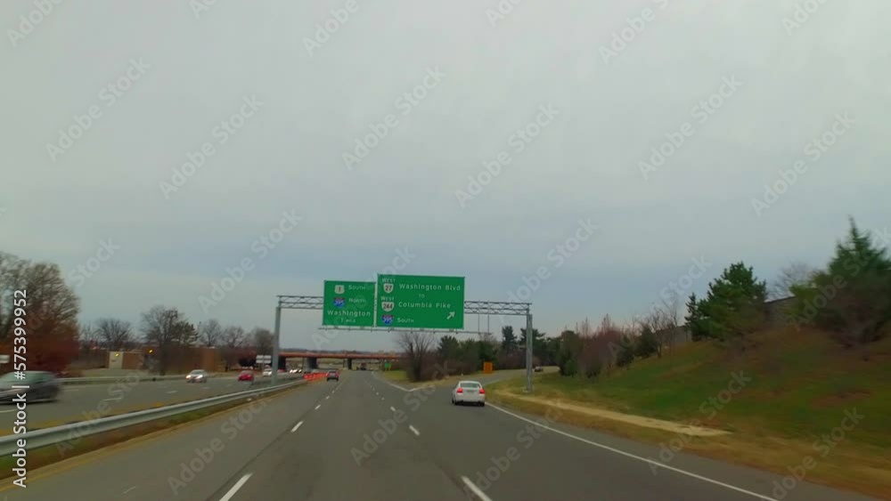 Point Of View Cars Moving On Roads Under Overhead Board Against Sky - Washington, District of Columbia Point Of View Cars Moving On Roads Under Overhead Board Against Sky - Washington, District of Columbia