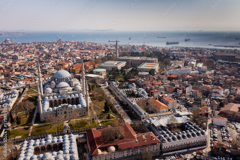 Beautiful view of gorgeous historical Suleymaniye Mosque, Rustem Pasa Mosque and buildings in a cloudy day. Istanbul most popular tourism destination of Turkey. Travel Turkey concept.