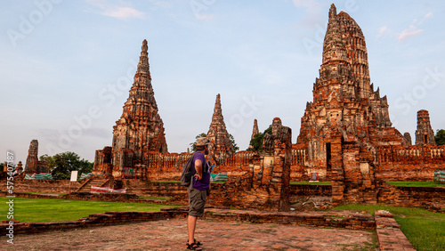 tourist admiring the ruins Wat Chaiwatthanaram in ayutthaya