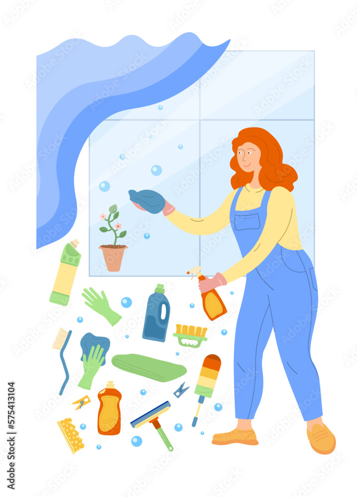 A woman washing a window with a lot of cleaning products.