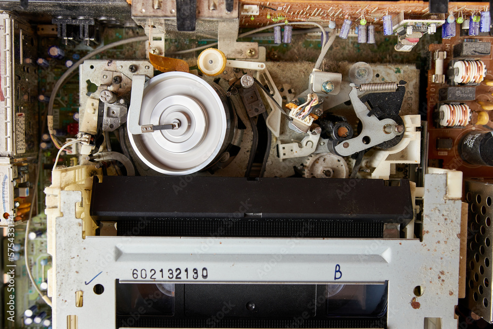 Loading a VHS tape and the operation of the tape extension mechanism of