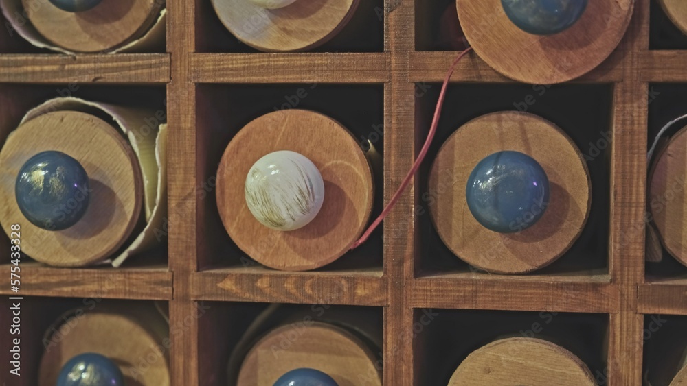 Fototapeta premium Historical Manuscript Antique Ancient Parchment Scrolls Stored in Wooden Tubes Archived in University Library