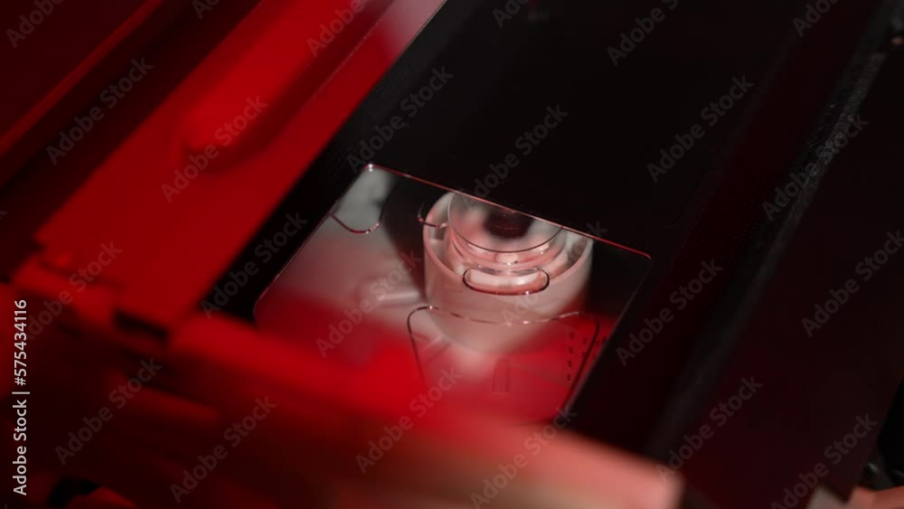 A cassette is inserted into the VCR, and the drum with the film spins