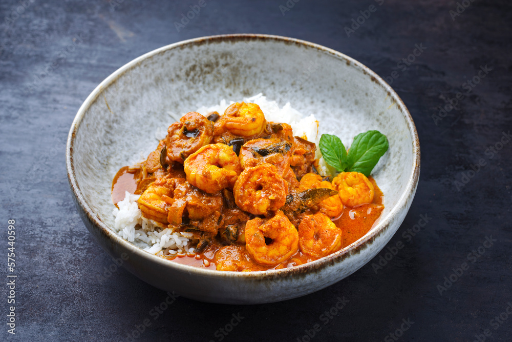 Ταπετσαρία Traditional spicy Indian prawn Madras curry Rogan Josh with king prawns and basm