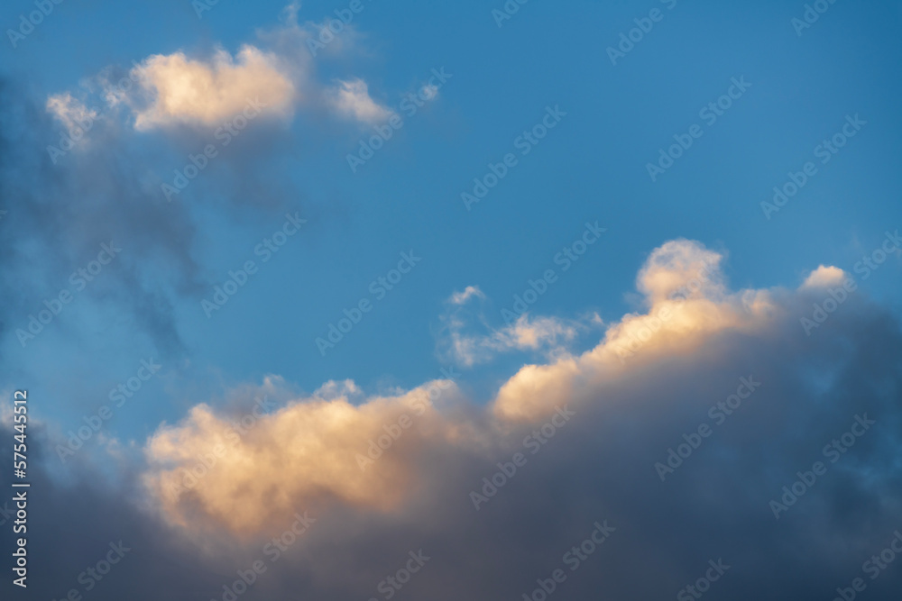 Beautiful  clouds on the  blue sunset sky. Sky clouds background.