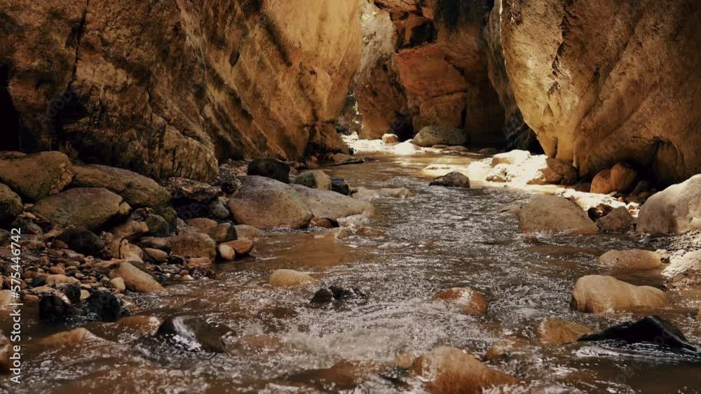 Beautiful mountain river. Landscape and stream of clear water. Mountain stream between the rocks. 4k. Beautiful mountain river. Landscape and stream of clear water. Mountain stream between the rocks. 4k.