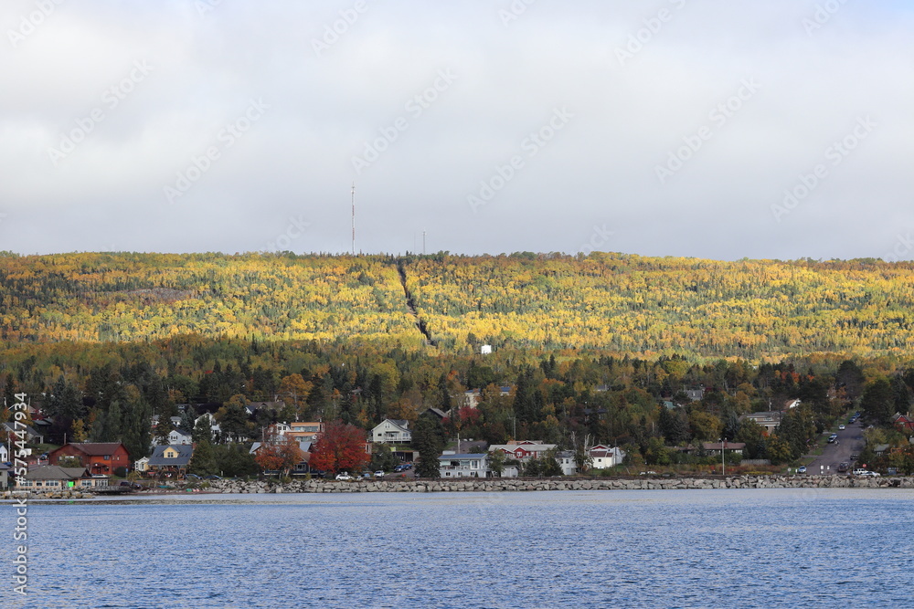 Naklejka premium View of downtown and the autumn trees in Grand Marais, harbor in Northern Minnesota 