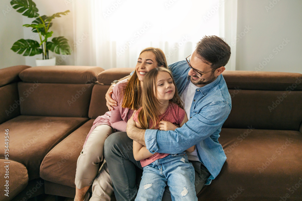 Smiling family enjoying together at home Smiling family enjoying together at home