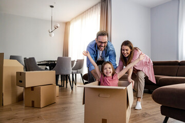 Happy family is moving into new home