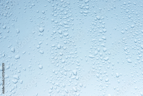 water drops on gray and blue surface