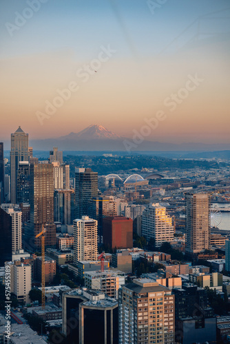 View of Seattle skyline at dusk on summer evening with view of Mount Rainer, Washington State