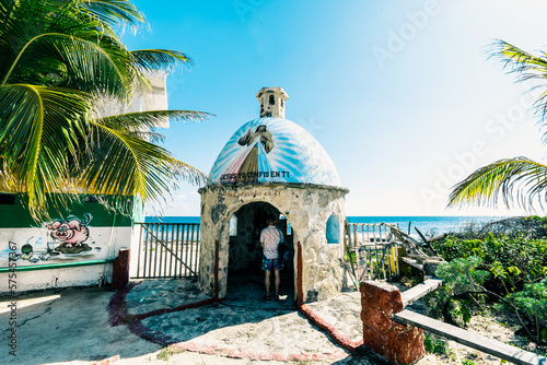 beach with palm trees and boat