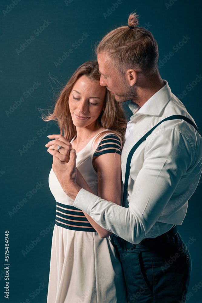 young sensual couple is now engaged after proposal she wear an engagement ring and he hold her hand while both are in love young sensual couple is now engaged after proposal she wear an engagement ring and he hold her hand while both are in love
