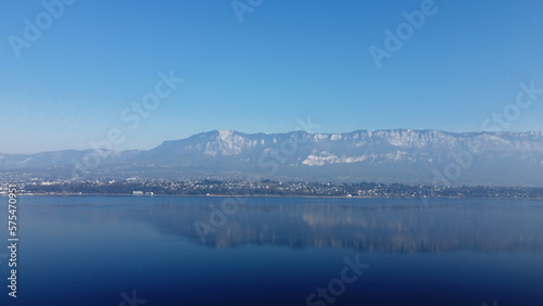 View over a lake. Blue sky and mountain.