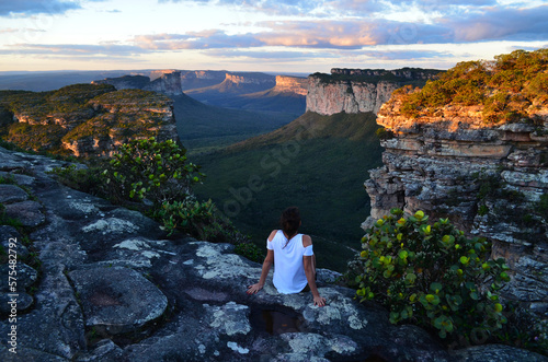 A relaxing girl enjoying a view of the Chapada Diamantina, Brazil photo