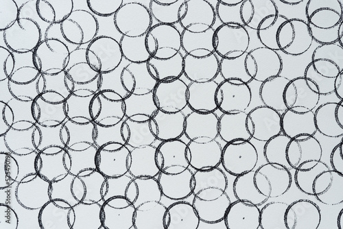 overlapping ink stamp circles on paper