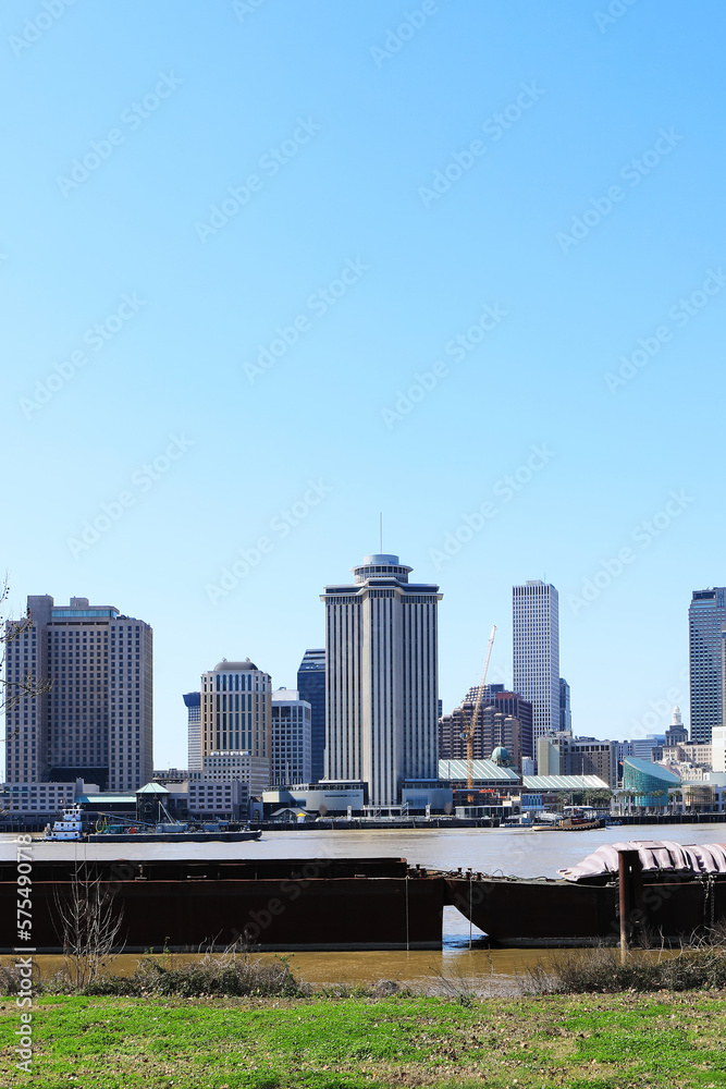 Vertical of the skyline of New Orleans, Louisiana, United States across Mississippi River Vertical of the skyline of New Orleans, Louisiana, United States across Mississippi River