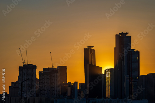Silhouettes of tall buildings in Yeouido, Seoul, South Korea taken at sunset time