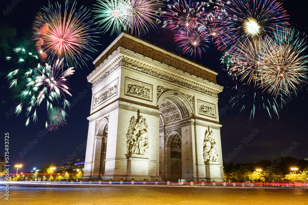 Arc De Triomphe with fireworks during New Year celebration in Paris. France