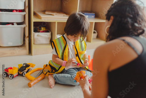 mom punishing her son while he plays in his room