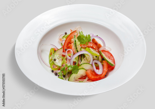 isolated tasty salad with tomato and cucumber and mix vegetables for menu design