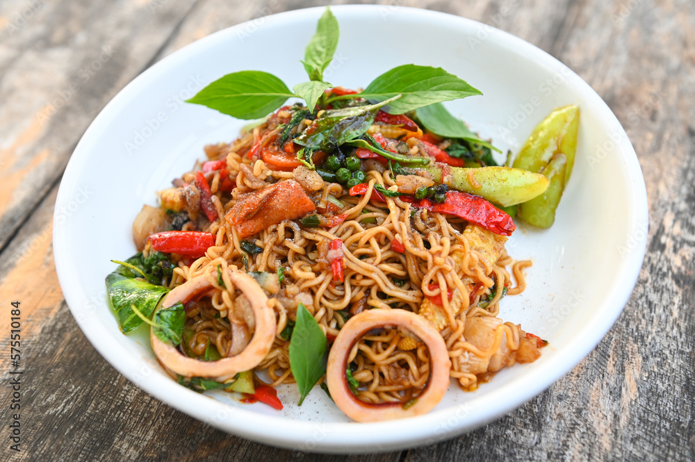 noodles plate with instant noodles stir fried with vegetables herb spicy tasty appetizing asian noodles mix seafood stir fried squid with basil and chilli pepper noodles plate with instant noodles stir fried with vegetables herb spicy tasty appetizing asian noodles mix seafood stir fried squid with basil and chilli pepper