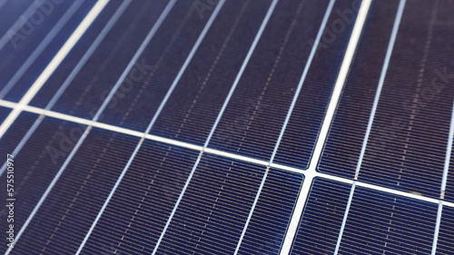 Solar panel closes up. detail of a photovoltaic panel for renewable electric production  background texture with copy space and selective focus.