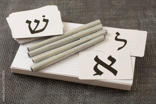 Tools for learning biblical Hebrew of index cards for vocabulary, calligraphy pens and alphabet flash cards photo