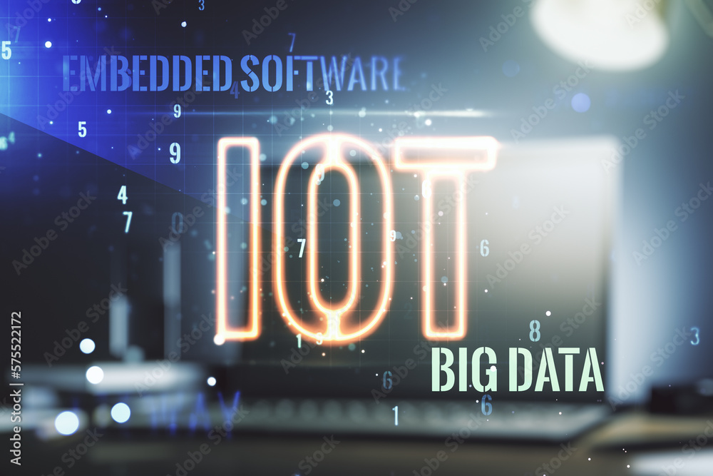 Obraz premium Creative IOT hologram on modern laptop background, internet of things concept. Multiexposure