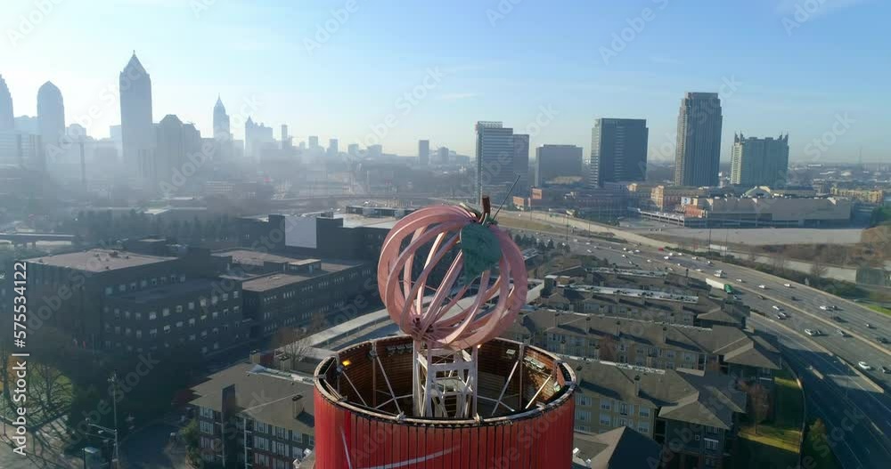 Aerial Tilt Up Shot Of Peachtree Tower, Drone Flying Backward Over Cars Moving On Roads In City - Atlanta, Georgia