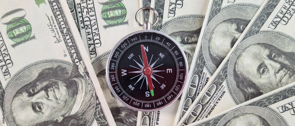 Compass and money dollars financial course for money investment Compass and money dollars financial course for money investment