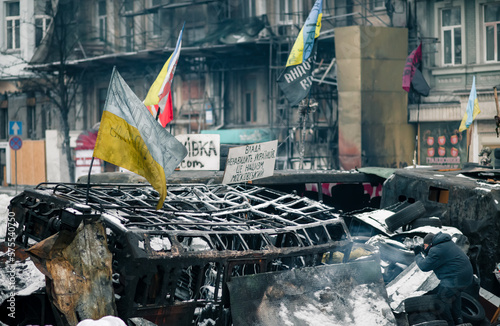 Revolution of Dignity in Ukraine. Burned bus on the barricades in Kyiv during Maidan revolution in 2014